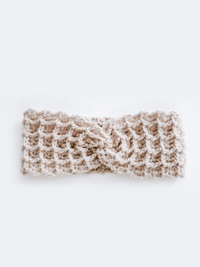 A waffle textured crochet headband.